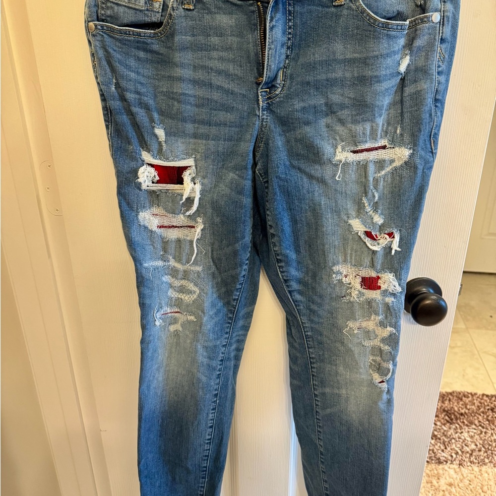 Torrid Distressed Blue Jeans with Red Accents size 10